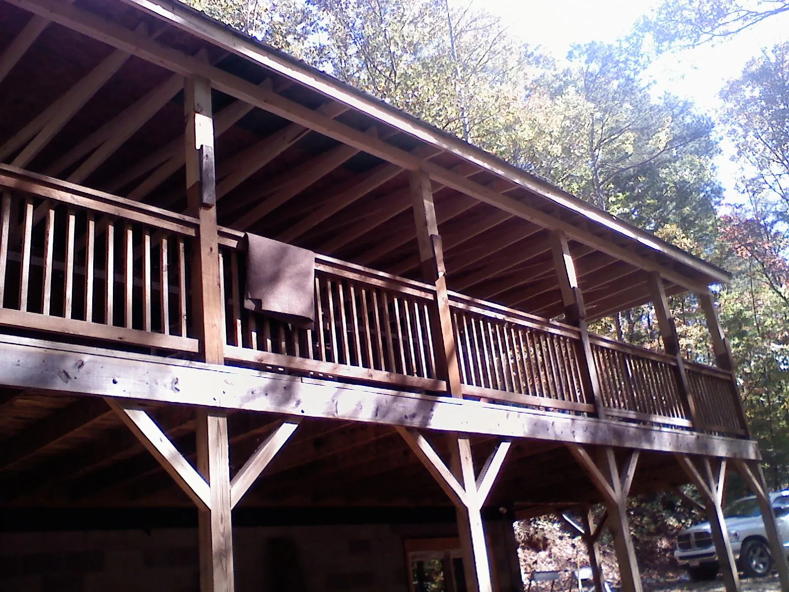 Timber framing under a new elevated porch and deck — Roof Leak Repair in Wimbledon by Roofing Brothers